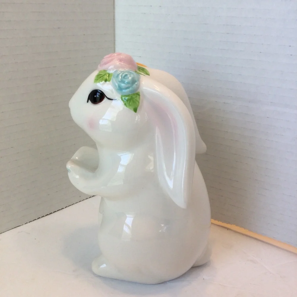 Ceramic Bunny Figurine holding book with Floral Accents